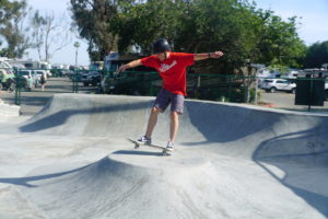boy skateboard at friendly bowl