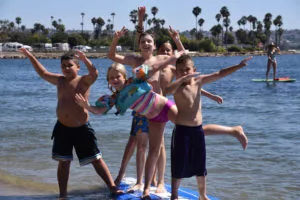 kids playing at the public beach