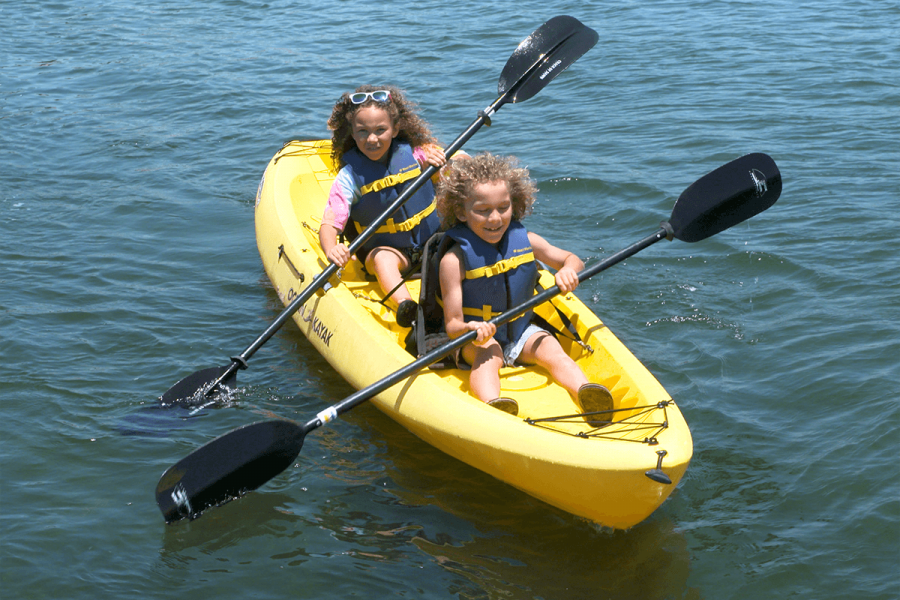 two young girls kayaking